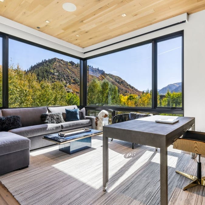 Cornered Room with Wood Paneled Ceiling