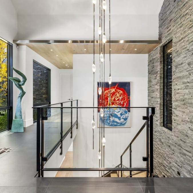 Glass Railing with Window to Wine Cellar