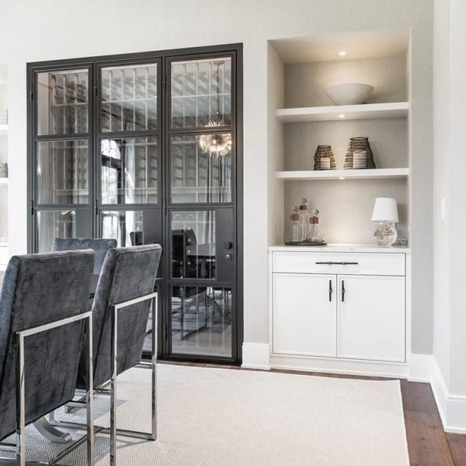 Dining Room Adjacent to Walk in Wine Cellar with Built-In Shelving Dining Room Adjacent to Walk in Wine Cellar with Built-In Shelving